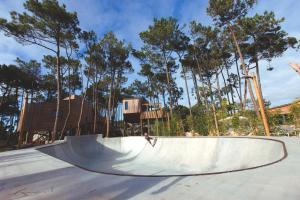 a person riding a skateboard on a ramp at a skate park at Bukubaki Eco Surf in Ferrel