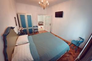 Krevet ili kreveti u jedinici u okviru objekta Antique Apartment Sibiu