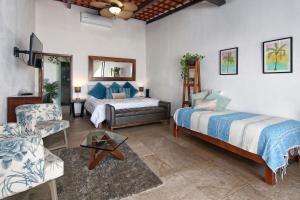 Llit o llits en una habitació de Hotel Vista Oceana Sayulita