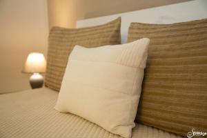 Letto o letti in una camera di SalernoPrestige rooms