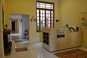 Area lobi atau resepsionis di Giuseppe Suites Hotel