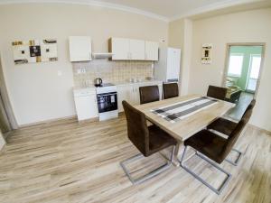 A kitchen or kitchenette at Apartmány ORAVA-EDDA