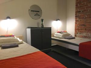 Posteľ alebo postele v izbe v ubytovaní Hostel Suomenlinna