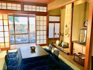 אזור ישיבה ב-Guesthouse Kyoto Arashiyama