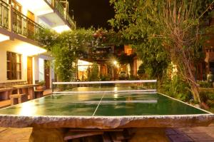 Instalaciones para jugar al tenis de mesa en Hostal Pachamama o alrededores