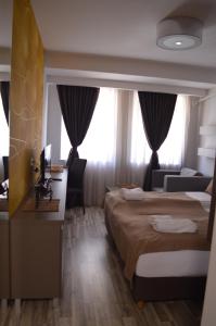 Krevet ili kreveti u jedinici u objektu Ohrid Luxury Studios