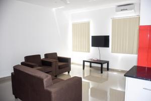 A television and/or entertainment centre at "Best View Hotel & Apartments"