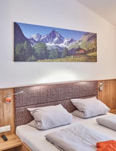 Letto o letti in una camera di Holiday Penthouse Moosweg