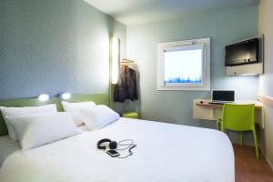 Krevet ili kreveti u jedinici u objektu ibis budget Cabourg Dives sur Mer