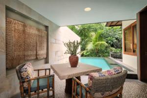 Бассейн в The Purist Villas & Spa Ubud или поблизости