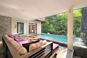 Бассейн в The Purist Villas & Spa Ubud или поблизости