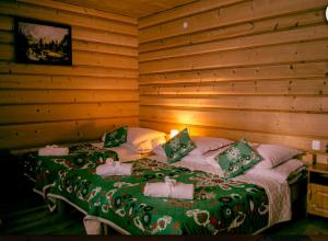 A bed or beds in a room at Agrotatry U Stachy