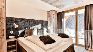 Krevet ili kreveti u jedinici u objektu Mountain Spa Residences