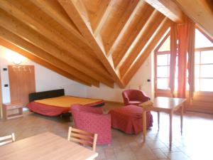 A seating area at Residence Le Orchidee