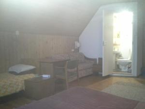 Кровать или кровати в номере Koidu Homestay