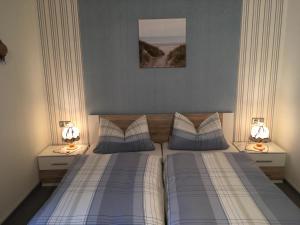 Cama ou camas em um quarto em Pension Haus Wanninger