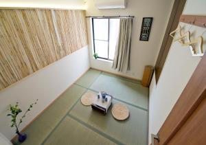 an overhead view of a room with a table and a window at Lucy's House横浜中華街 House1 in Yokohama