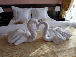 Krevet ili kreveti u jedinici u objektu Indiana Hotel