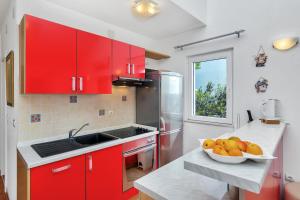 A kitchen or kitchenette at Villa Vranic Apartments