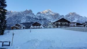 Grazioso appartamento in casa di montagna a San Vito di Cadore בחורף