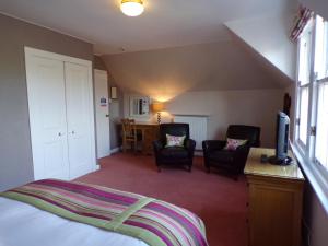 Кровать или кровати в номере Shaftesbury Hotel Dundee