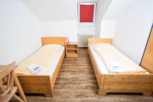 Cama ou camas em um quarto em YoHo - International Youth Hostel