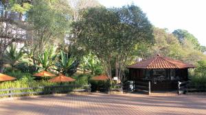 a pavilion in a park with trees and a fence at Monteverde in Mazamitla