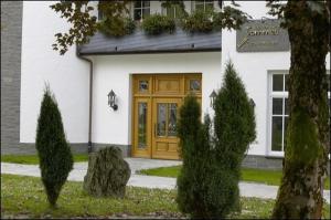 En hage utenfor Land- und Kurhotel Tommes