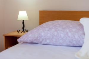 Krevet ili kreveti u jedinici u okviru objekta Rooms Marinac