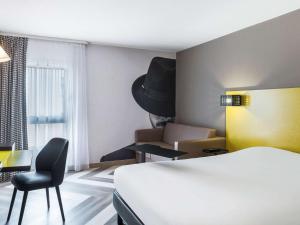 Krevet ili kreveti u jedinici u okviru objekta Ibis Styles Nice Centre Port