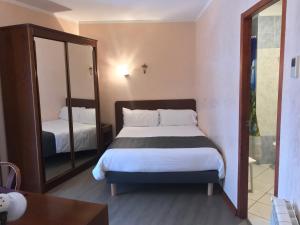 Hôtel Vesuvio में एक कमरे में एक या कई बेड