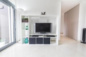 A television and/or entertainment centre at modern flat