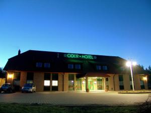 a building with a sign that reads opera hotel at Oder-Hotel in Schwedt