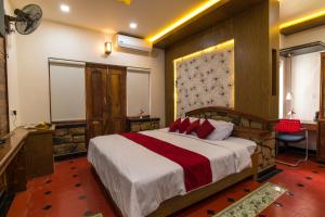 Olives The Boutique Resort में एक कमरे में एक या कई बेड