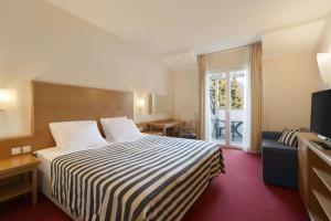 Ramada Hotel & Suites Kranjska Gora 객실 침대