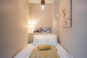 Cama ou camas em um quarto em Appartement Lyon Gerland - Enjoy in Lyon