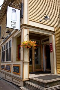 a building with a sign that reads salt street deli at Salt Shaker Deli & Inn in Lunenburg