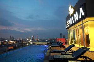 Levana Pattaya Hotel - SHA Extra Plus में या उसके करीब स्विमिंग पूल