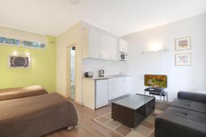 Una cocina o kitchenette en Ultimate Apartments Bondi Beach