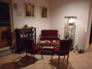 A seating area at Hotel Trieste