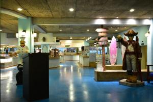 a store with a statue in the middle of a room at Crown Paradise Club All Inclusive in Puerto Vallarta