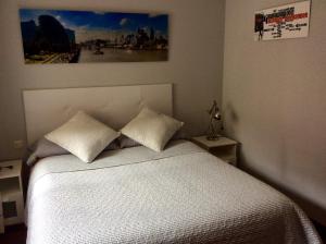 Cama ou camas em um quarto em Macky's Pad