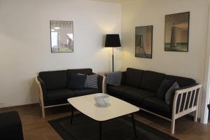 Khu vực ghế ngồi tại Odense Apartments