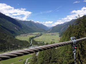 a view of a valley from a rope bridge at Apart Andrea in Längenfeld