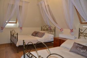 Luksusowy Apartament przy Plaży Niegocin 객실 침대