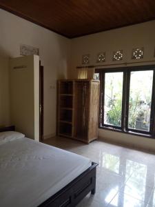 A bed or beds in a room at Mimba Private House