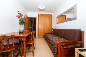 Кът за сядане в apartamentos Quebra-Mar