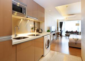 Yuwa Serviced Residence 주방 또는 간이 주방