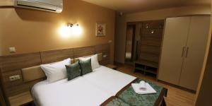 Cama ou camas em um quarto em Garden Guest House