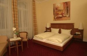 Кровать или кровати в номере Hotel Schweizer Hof - Superior